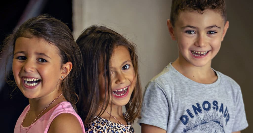 Children laughing and smiling